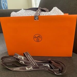 Hermès Orange Bag with Brown Ribbon